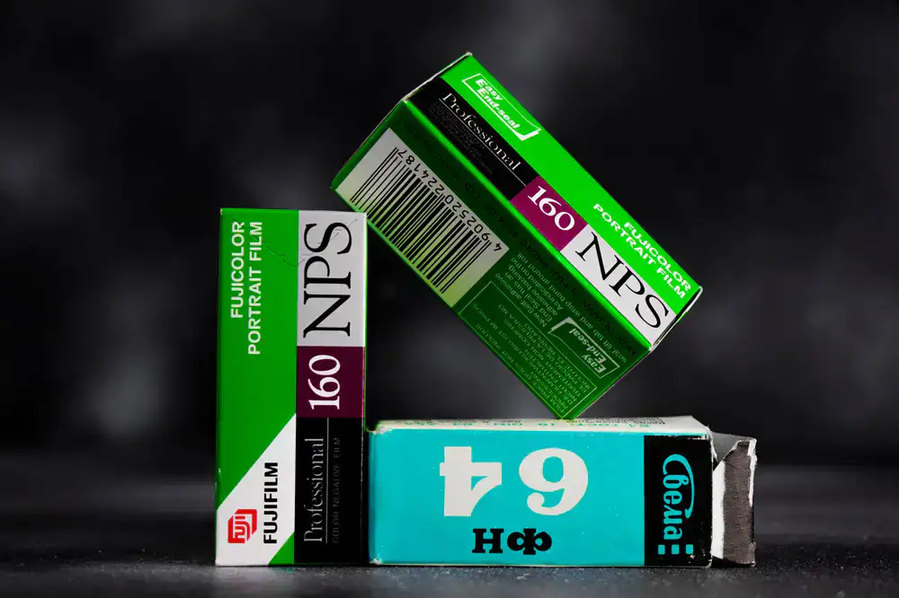 Stack of colorful 35mm film boxes