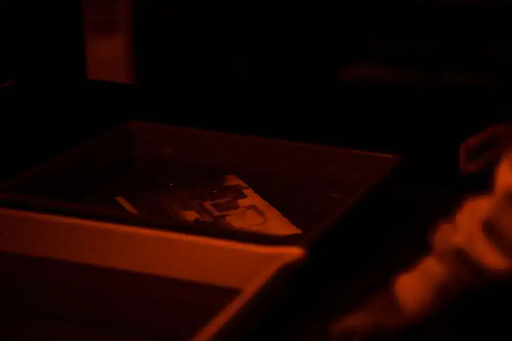 Moody view of film spools in a darkroom