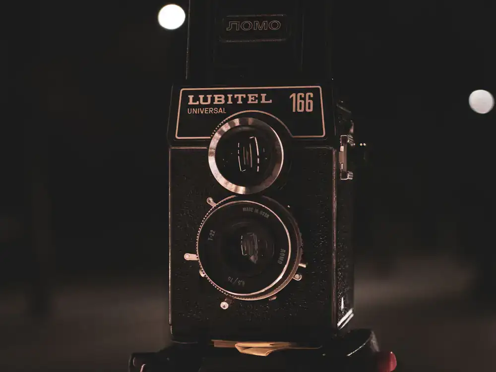 Looking through the viewfinder of an analogue camera